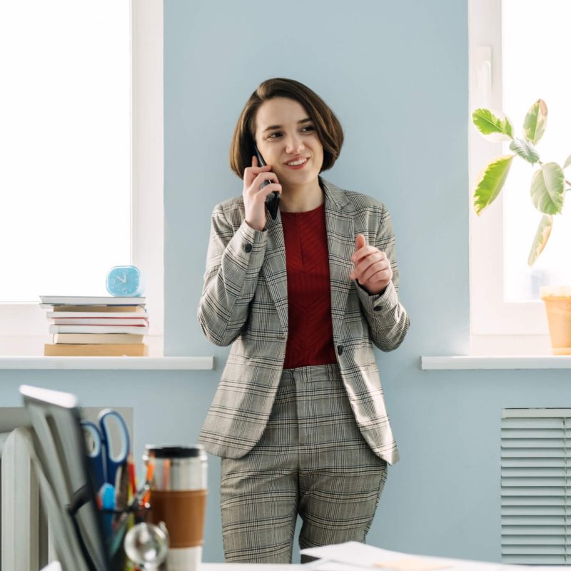 legal-business-consultant-legal-advisor-female-lawyer-businesswoman-talking-on-cell-phone-1.jpg